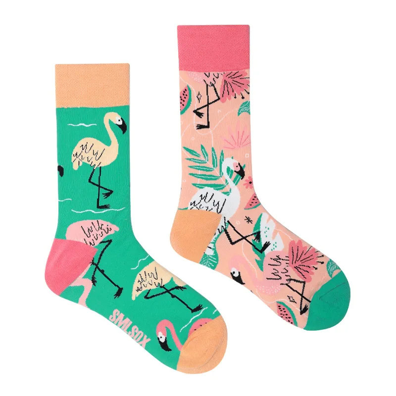 Two colorful socks with flamingo design on a white background