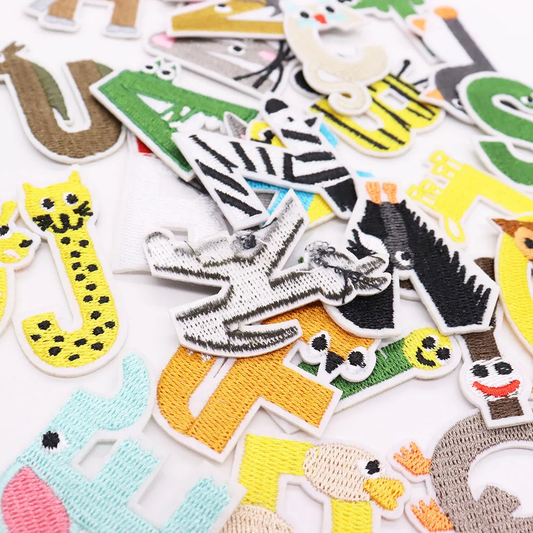 Collection of colorful animal-themed patches on a white background
