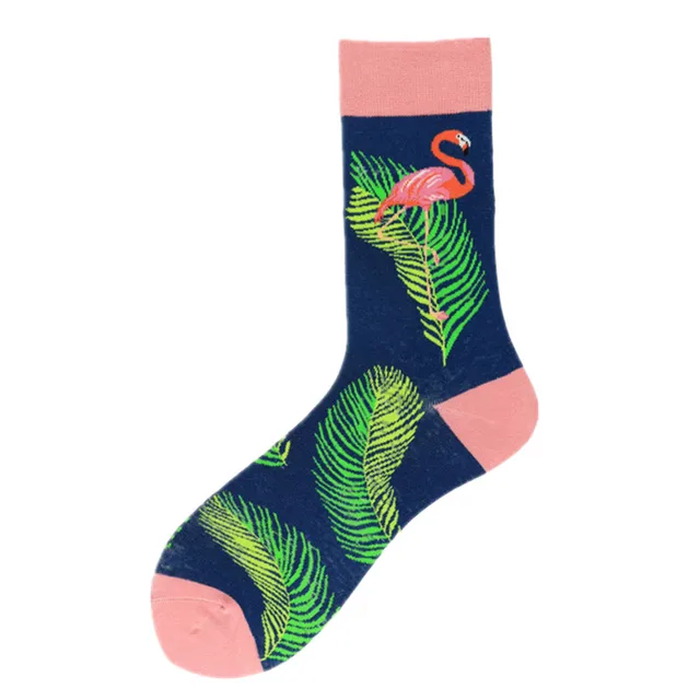 A pair of crew socks with a vibrant flamingo and tropical leaf pattern in pink, green, and blue colors.