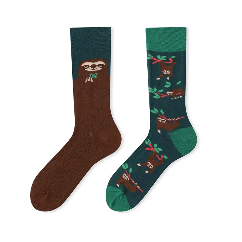 Two socks with sloth designs on a white background