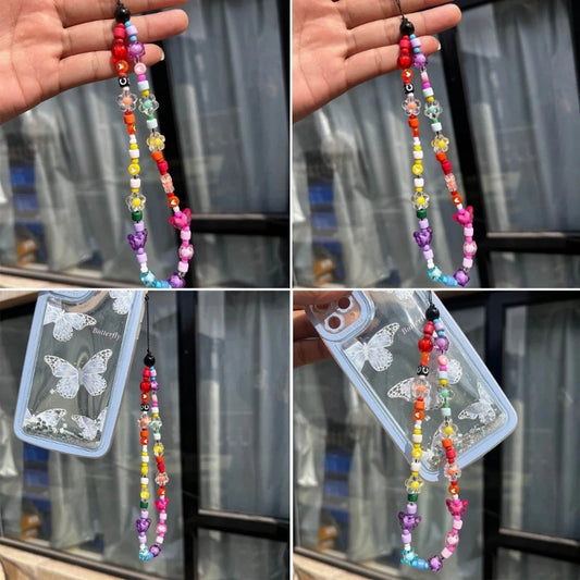 Colorful beaded necklace with butterfly design phone case held by a hand.