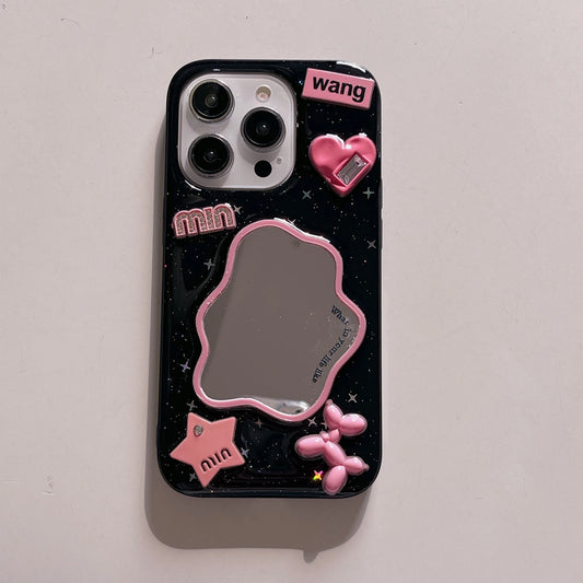 A black phone case with pink and silver 3D embellishments, including a wavy mirror, a dog balloon, and text reading 'min' and 'wang', shown on a light gray background.
