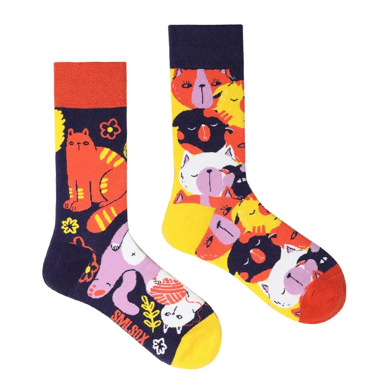 Colorful socks with cat patterns on a white background