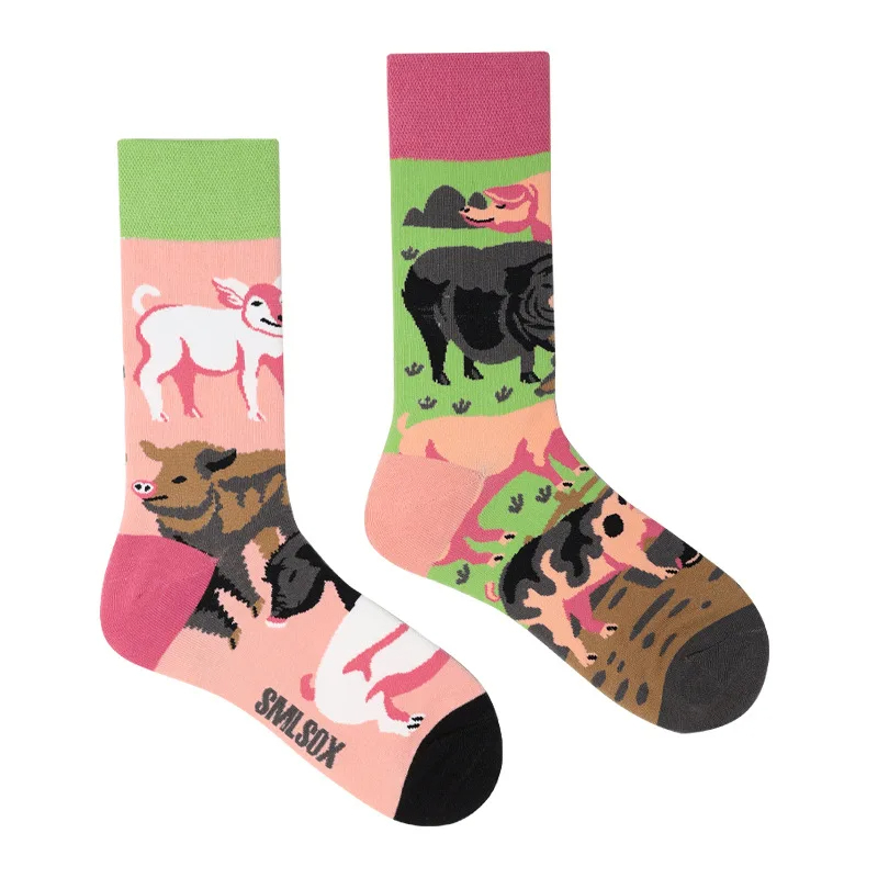 Two colorful socks with animal designs on a white background