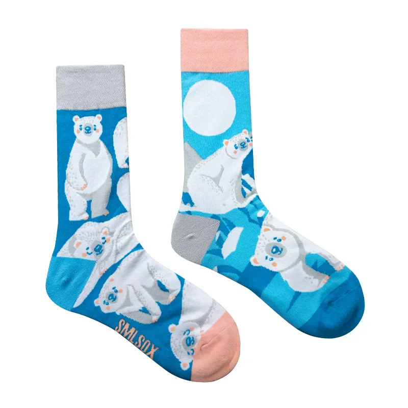 Two socks with polar bear design on a white background
