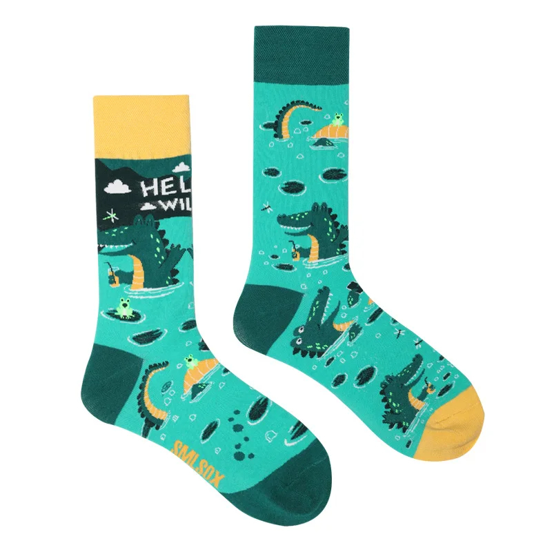 Teal socks with dinosaur pattern on a white background