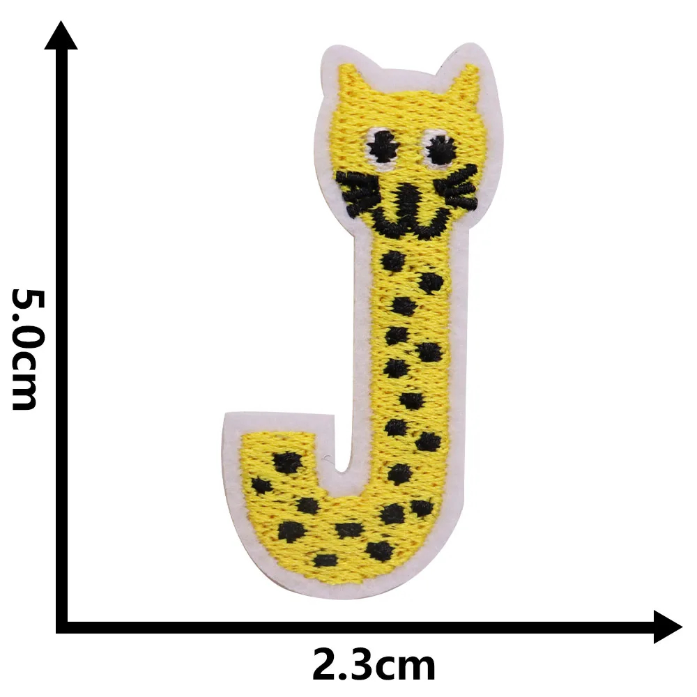 Yellow letter 'J' with cat face design and measurements on a white background