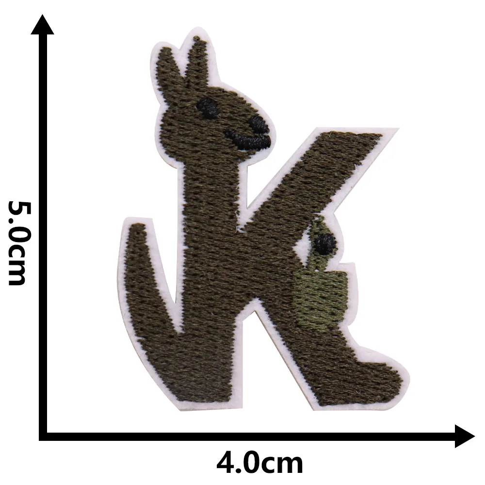 Patch of a letter 'K' with dimensions 5.0cm x 4.0cm on a white background