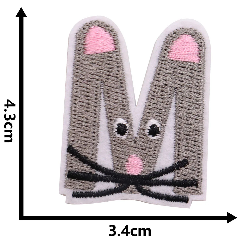 Embroidered mouse patch with dimensions on a white background