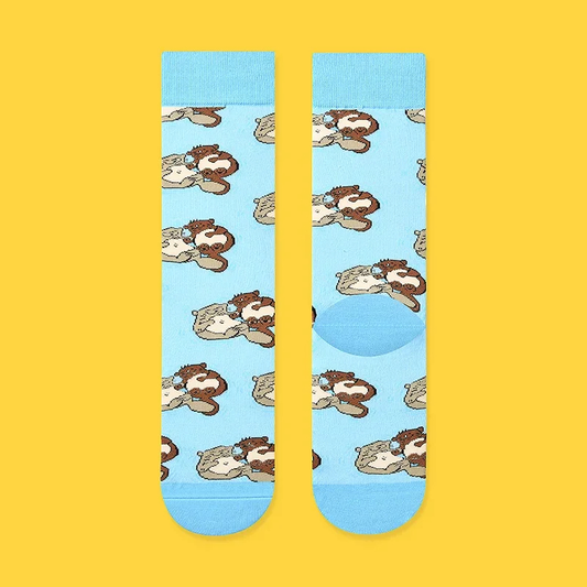 Socks with otter pattern on a yellow background