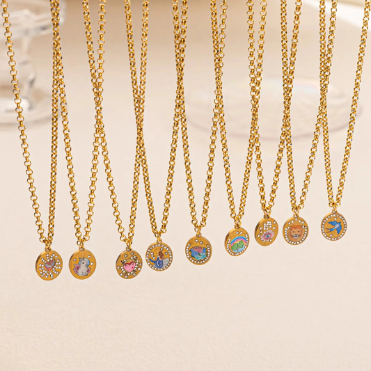 Gold necklaces with circular pendants on a beige background