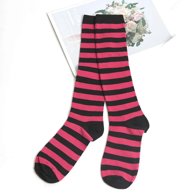 Black and pink striped socks on a white background