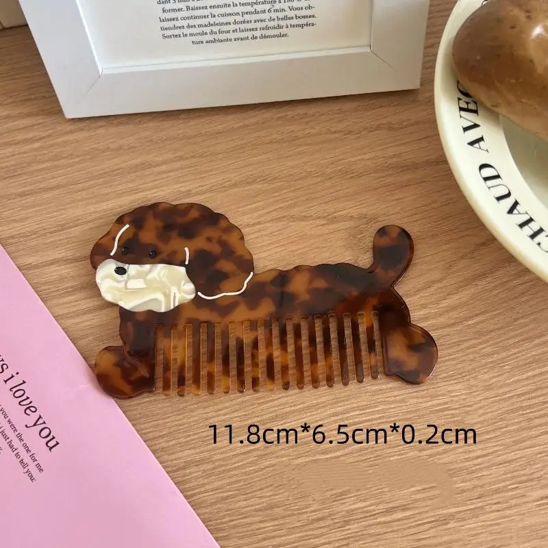 Tortoiseshell dog-shaped comb on a wooden surface with text overlay.