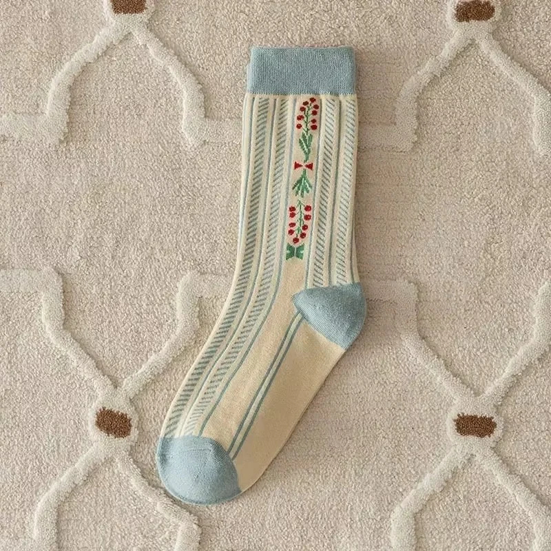 Decorative sock with floral pattern on a textured surface