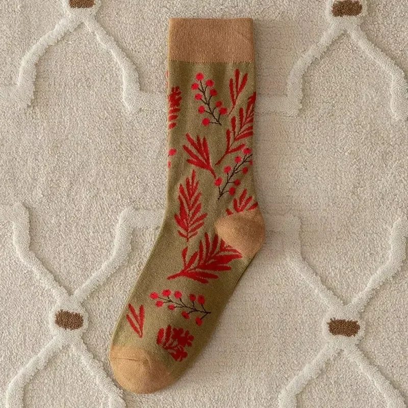 Sock with red floral pattern on a textured surface