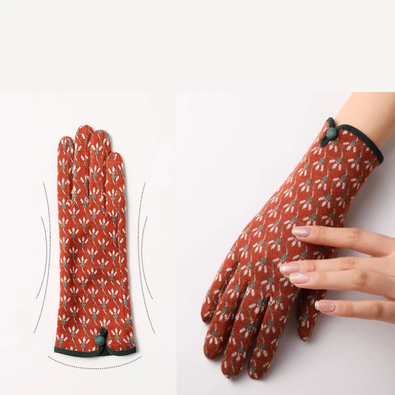 Pair of patterned gloves on a white background