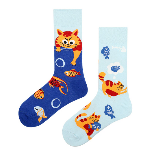 A pair of blue ankle socks with cartoon cats and fishes design, intended for adults.