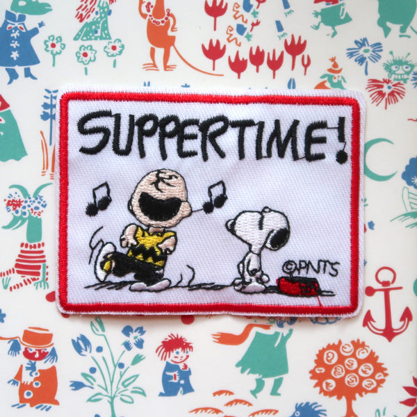 Snoopy and dancing Charlie Brown "Suppertime!" embroidered patch badge appliqué