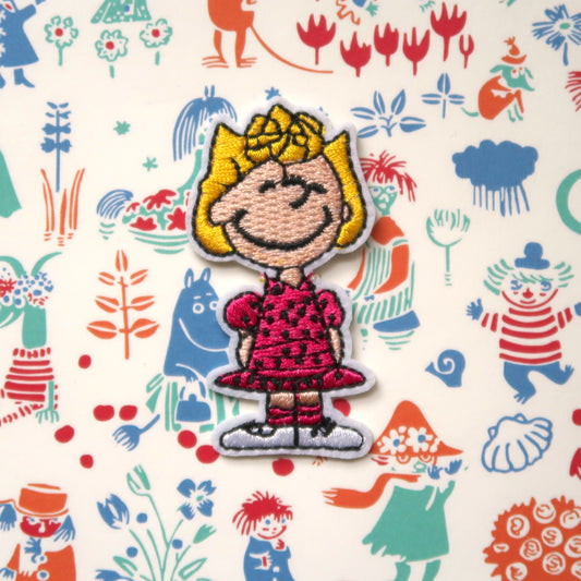 Sally Brown from the Snoopy/Peanuts comics embroidered iron-on patch badge appliqué