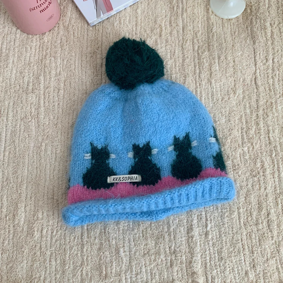 Kitten Row Knitted Pom Pom Beanie Hat