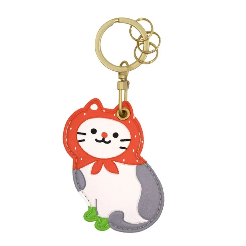Keychain with a cartoon cat design on a white background