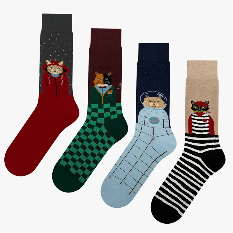 Four pairs of socks with cartoon cat designs on a white background