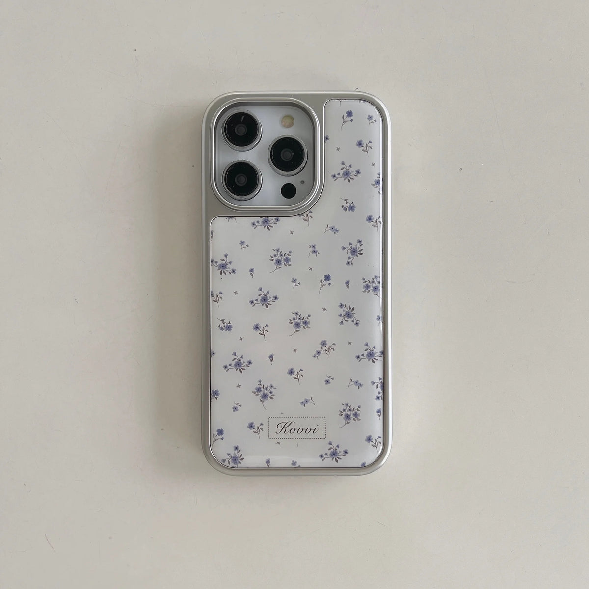 Phone case with floral pattern on a light gray background