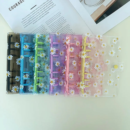 Set of colorful plastic dividers with floral design on a white surface