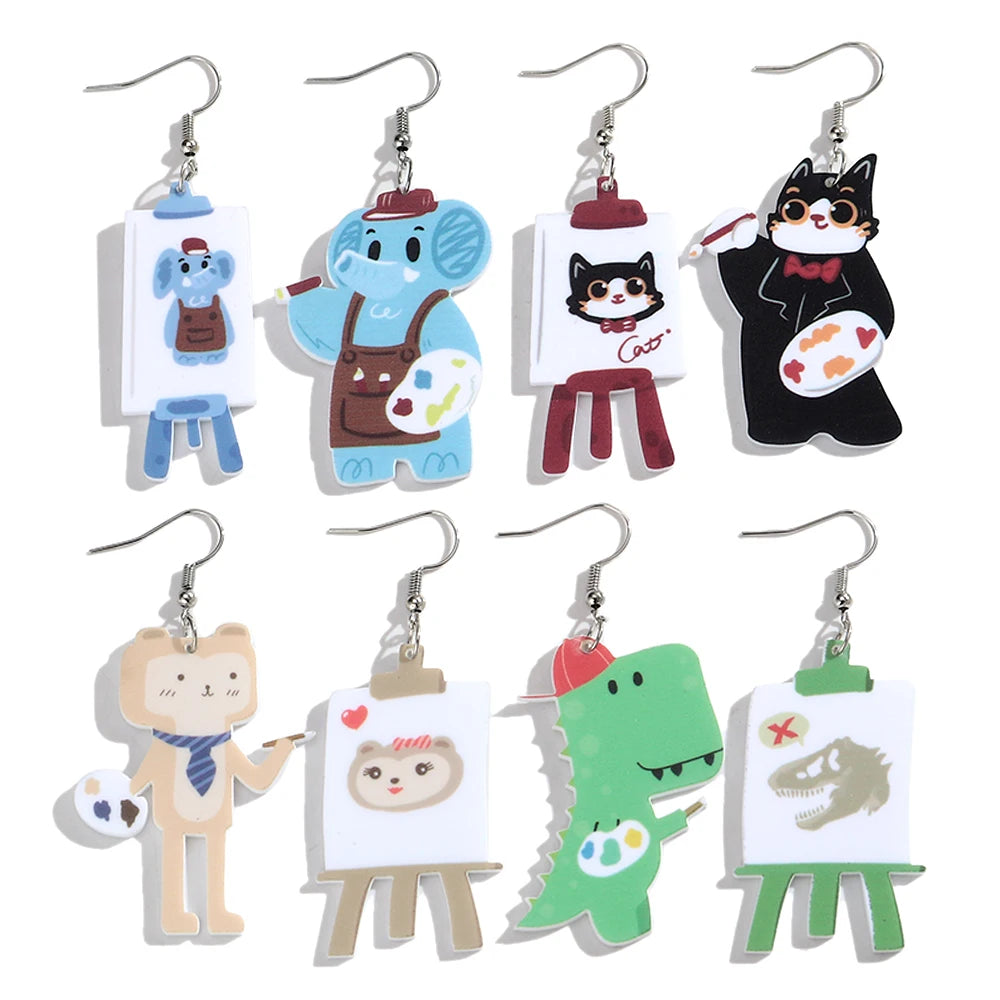 Set of cartoon character earrings on a white background
