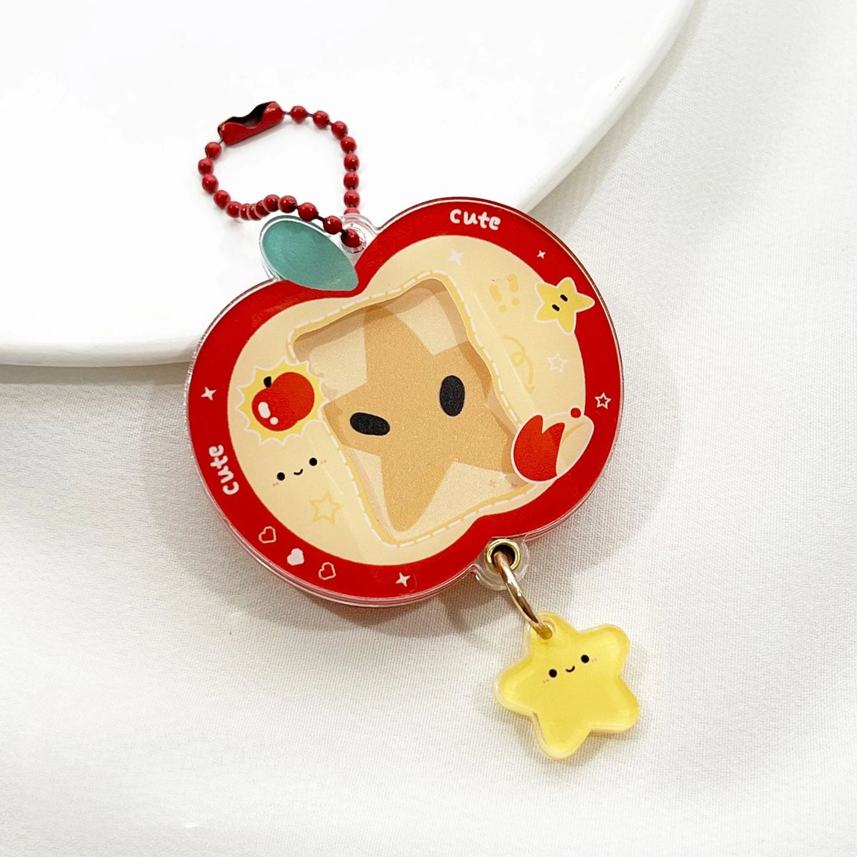 Cute keychain with a cartoon character on a white background