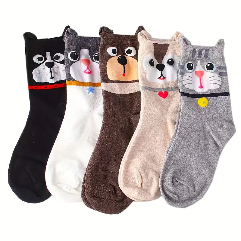 Five pairs of cartoon animal socks on a white background