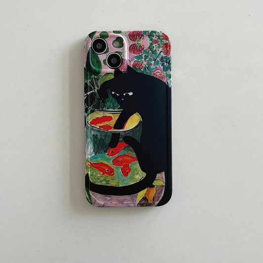 A phone case featuring a stylized black cat holding a bowl of red koi fish, set against a background of pink and green floral patterns, shown on a light gray surface.