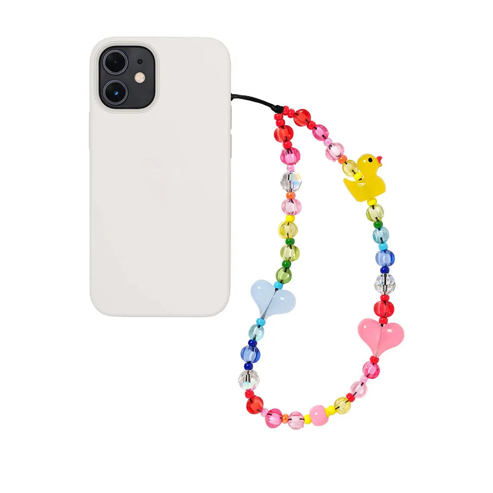 Phone case with colorful beaded strap featuring a rubber duck and hearts on a white background