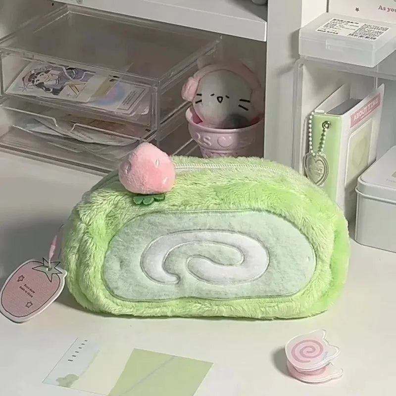 Green and white spiral-shaped product with a pink top on a desk