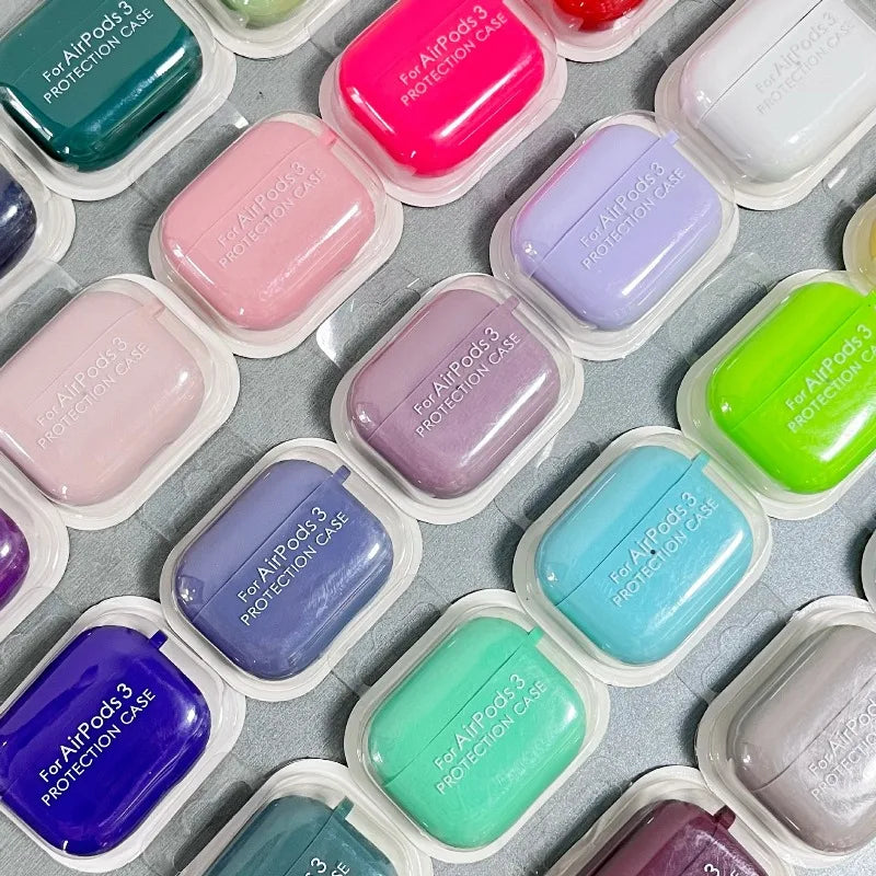 Colorful cases for AirPods 3 protection on a gray surface