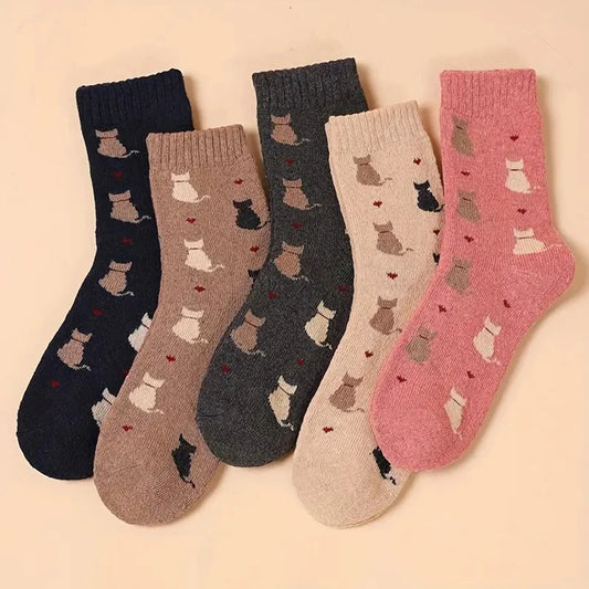 Five pairs of crew socks in different colors: navy blue, taupe, charcoal gray, and dusty pink. Each pair features a repeating pattern of cartoon cat silhouettes in matching colors with small red hearts.