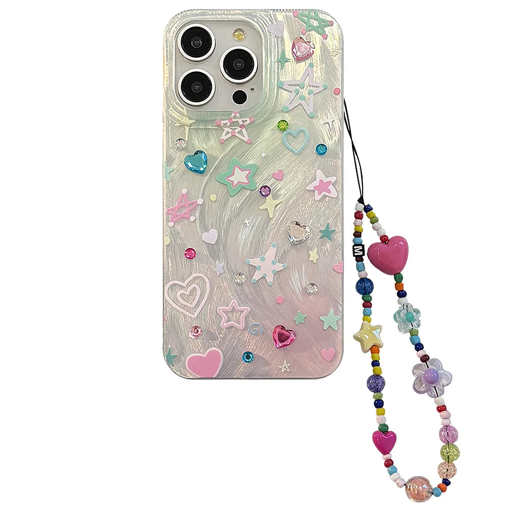 Phone case with decorative elements and a colorful lanyard on a white background