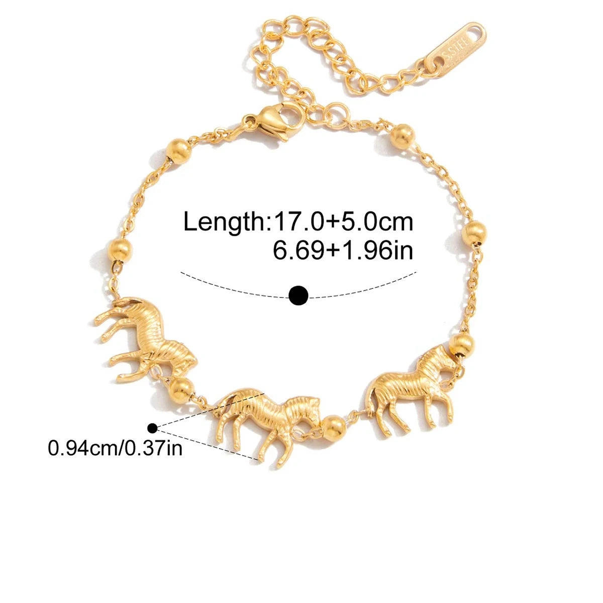 Gold bracelet with horse designs on a white background