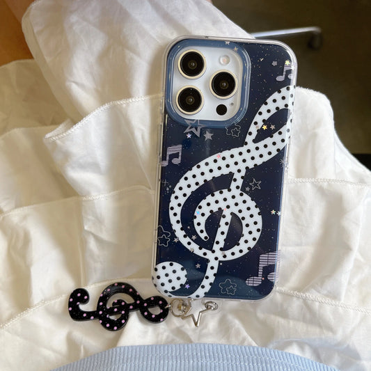 Phone case with music note design on a white fabric background