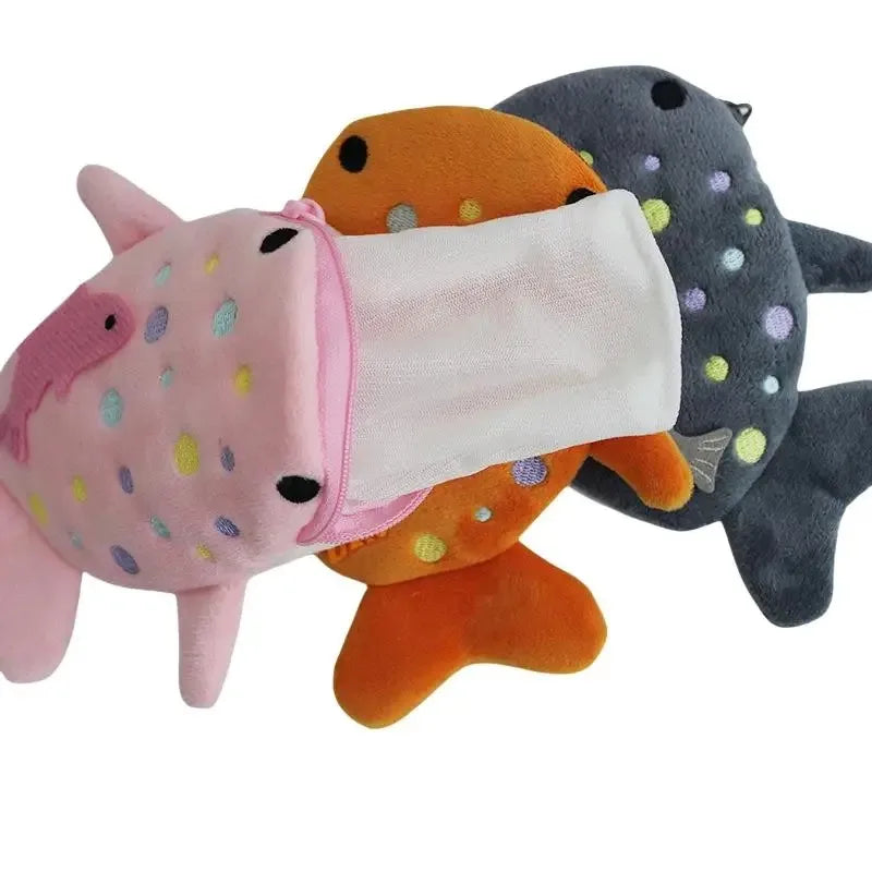 Three colorful shark-shaped plush toys on a white background