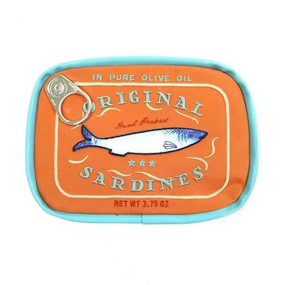 An orange and turquoise fabric pouch designed to look like a can of 'Original Sardines' in pure olive oil, featuring a printed fish illustration and a pull-tab design.