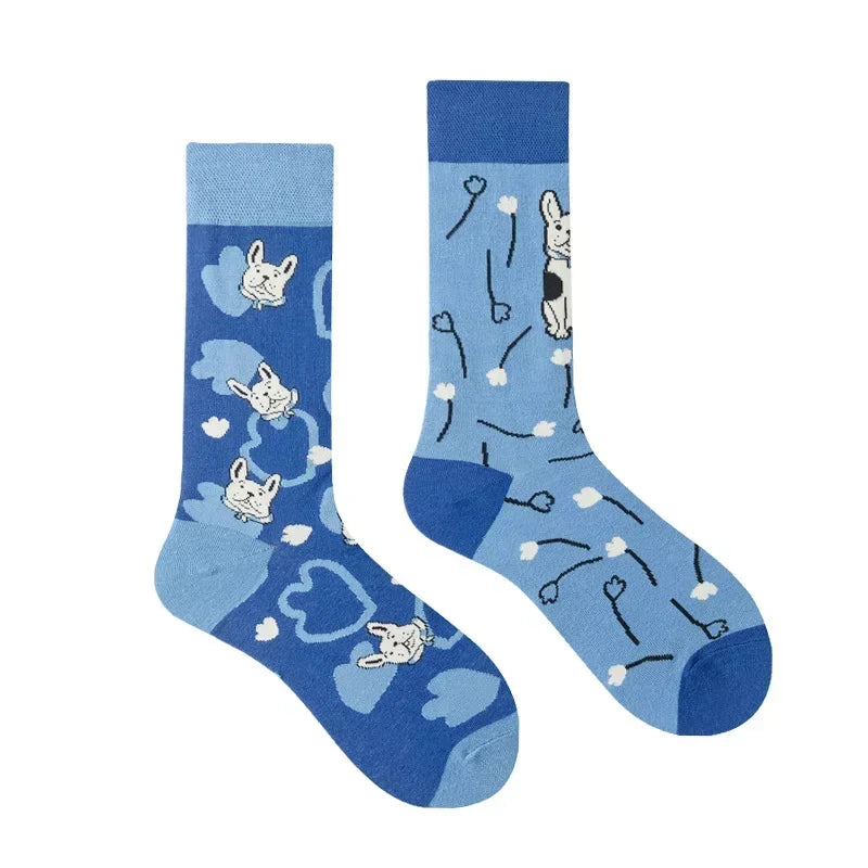Blue socks with dog pattern on a white background