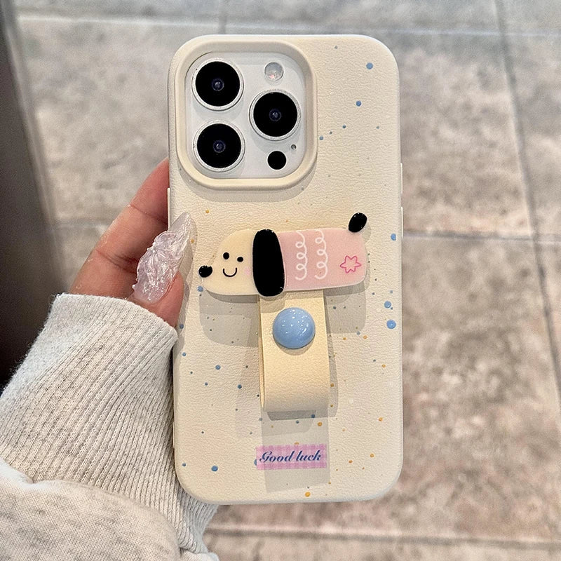 Phone case with cartoon character design held by a person