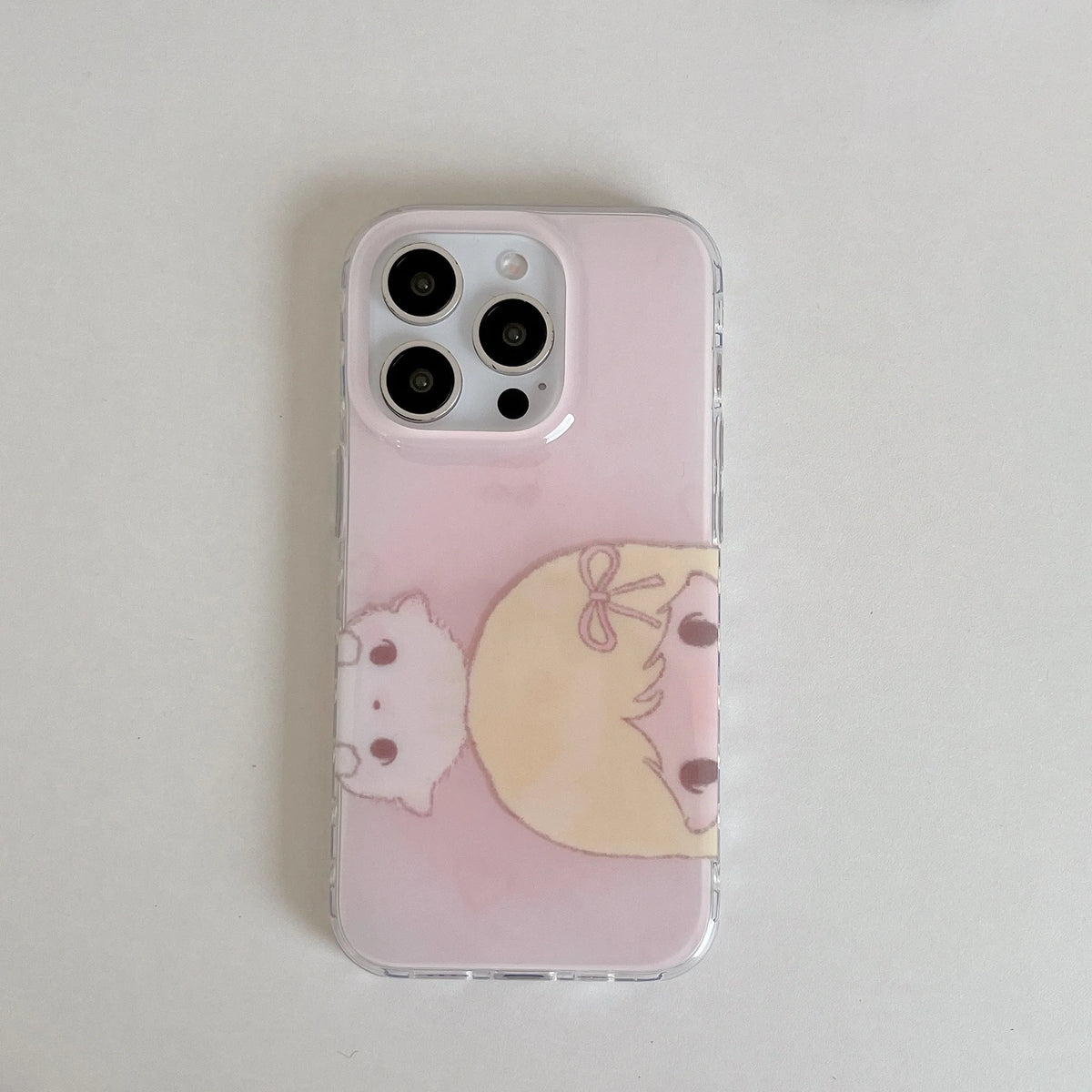 Phone case with cartoon design on a light gray background