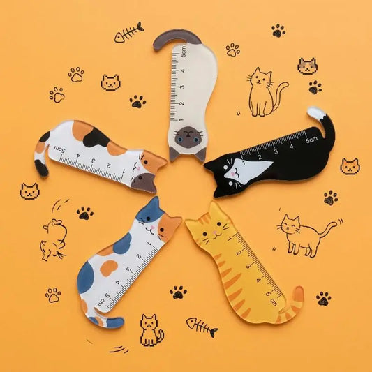Four cat-shaped rulers on an orange background with cat illustrations.