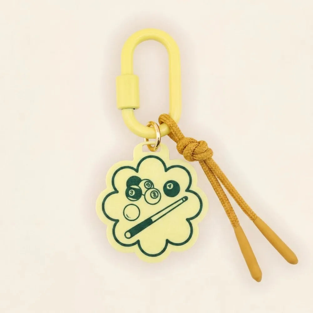 A pale yellow silicone carabiner keychain featuring a cloud-shaped charm with a green pool bill design and a tan braided cord, shown on a plain off-white background.