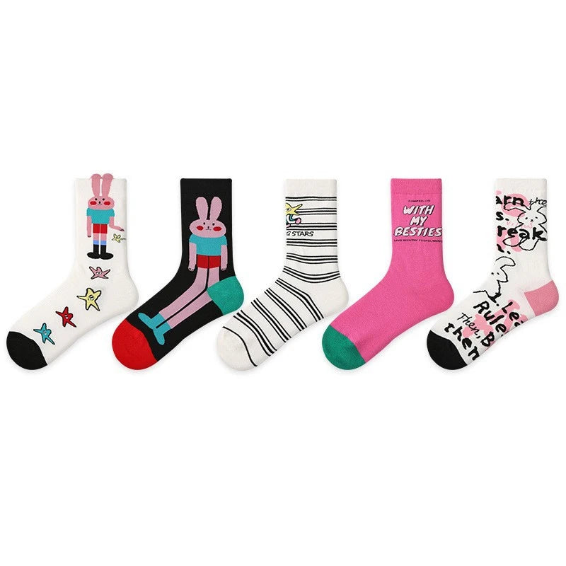 Five pairs of colorful socks with various designs on a white background
