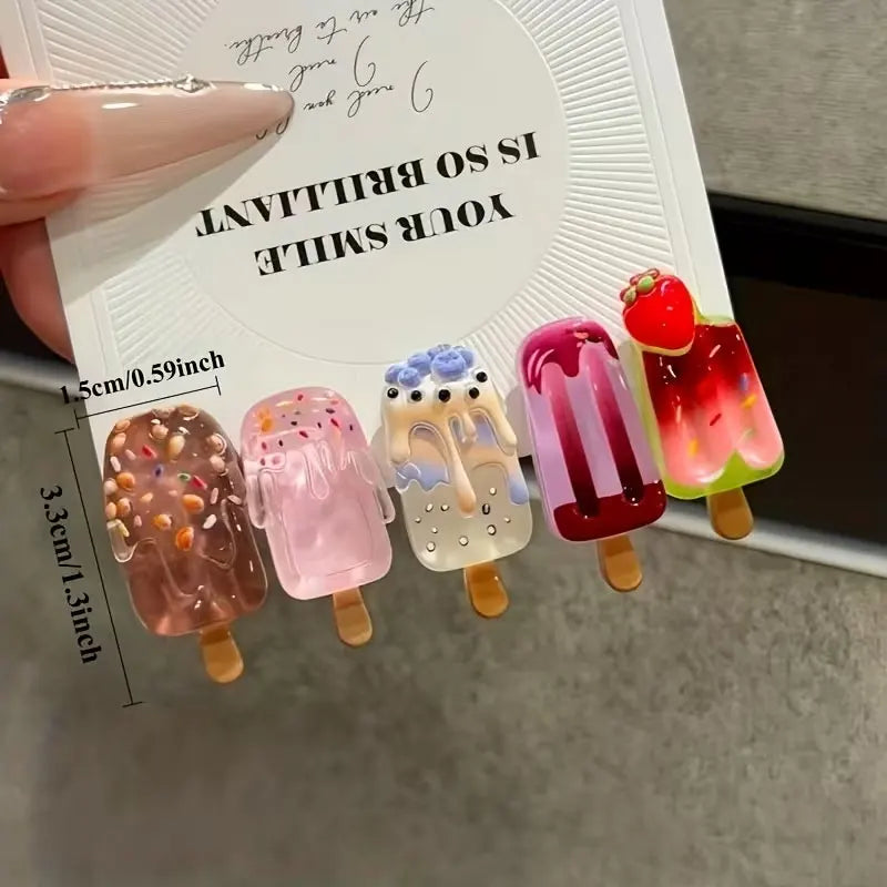 Set of colorful ice cream-shaped hair clips on a card with text