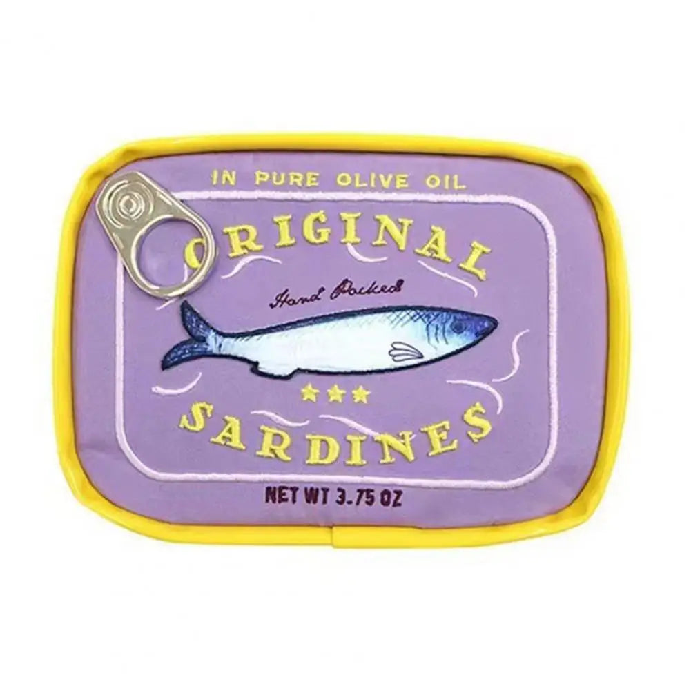 A novelty pouch designed to look like a sardine can, featuring a purple label with a blue and white sardine illustration, yellow text reading 'Original Sardines' and 'In Pure Olive Oil,' plus a yellow border and a pull-tab lid.