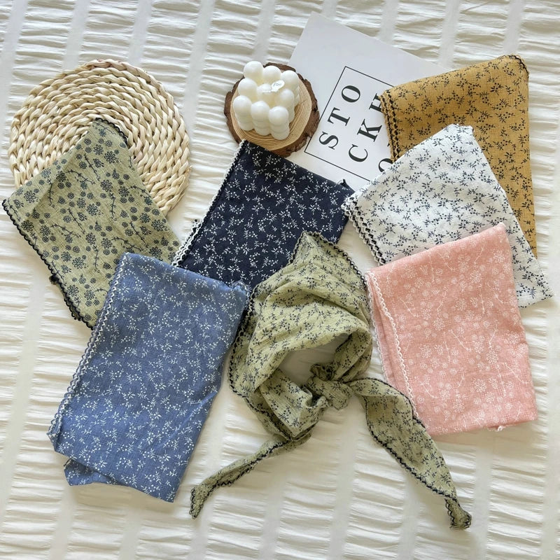 Collection of patterned fabric samples on a textured surface